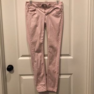 Light pink colored skinny jeans
